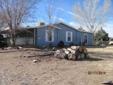 $148,800
Horse property with main building (Three BR mobile) and several out buildings.