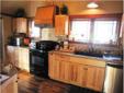 $225,000
This one-of-a-Kind Five BR Chalet has a rustic appeal and features unique