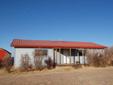 $70,000
1 acre lot with Two BR home, a workshop and a storage building.