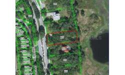 WATERFRONT LOT on Lake Bernadette!! One of two parcels available with 100' water frontage. Build your dream home on this partially wooded homesite in an area of upscale CUSTOM built EXECUTIVE homes! Brick column entrance, circular brick roundabout leads