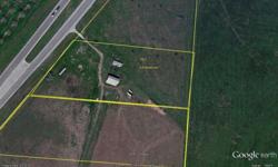 THIS IS COMMERCIAL PROPERTY, NOT RESIDENTAIL. Hwy Frontage for trucks, Great site for Commercial Building, Truck Yard, Laydown Yard, RV Park, etc. This trt is (+ or-) acreage, to be determined by survey. Additional Acreage is available.Listing originally