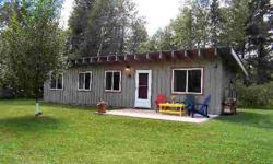 Delightful, secluded Chippewa River cabin, in absolute move-in and enjoy condition on 2.6 private wooded acres with 154' of gorgeous frontage. Totally remodeled in 2001, featuring a pocket door to the full bath, a freestanding woodstove, a big concrete