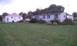 LARGE DOUBLE WIDE WITH ADD-ON AND FULL BASEMENT ON .75 ACRE NEAR STRASBURG AND HEATED THREE BAY GARAGE. Listing agent and office