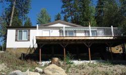 Let's all go to the Lake! Newer, 3 bedroom, 2 bathroom home in scenic Valley, Washington. An easy 47 mile drive from Spokane. Well-kept manufactured home built in 2007. The 40' x 15' trex, low-maintenance deck off of the living room will be where you can