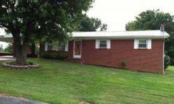 MOVE right in! This home is in excellent condition, with new vinyl windows, metal roof, hardwood floors, and heat pump. SPOTLESS inside and out, well cared for and ready for you to enjoy! Brick exterior has 2 car carport attached, concrete drive. Easy
