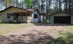 Located in the heart of Wisconsin's Northwoods, is this well maintained 3 Bedroom, 2 Full Bath home located on a .60 Acre wooded parcel. The backyard is fenced in and the 2 Car Detached Garage has plenty of room for all the toys! A large living room, a