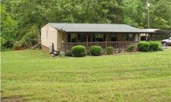 JUST REDUCED!New roof! Private retreat only minutes from Hwy 485(convenient to Charlotte Motor Speedway!) Newly graveled drive, landscaped yard and rocking chair front porch.Great place to watch the deer! Replacement windows,gas logs, open floor plan and