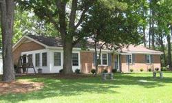Fantastic Brick Ranch w/Sunroom on UNRESTRICTED .85ac lot with circle dr. Lots of updates, new dishwasher, cabinets restained w/new hardware, new pergo floors in kitchen, den and hall, new ceiling fans, new gas water heater and vinyl replacement windows.