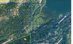 This property is located 1 mile north of the Conkling Marina & Resort on W. Conkling Park Rd. The property has a well and views of Carey Bay. 13.95 acres priced at only $105,000 Offered by Pacific Real Estate & Investment at 11100 N. Airport Dr. Hayden,