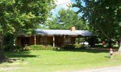 Location,price and condition will sell you on this nice 2 bedroom, 1 1/2 bath home situated on 6 acres in a great neighborhood. This home has an open floor plan with a fireplace, spacious kitchen,living room,formal dining room and nice size bedrooms,