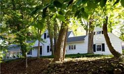 Charming Northside Summit Colonial in idyllic park setting! Sunny sophisticated home with expansion potential. Kit/baths newly renovated, expansive finished bsmt & laundry rm. Only 1 mile to train. Perched high on a hill surrounded by a forest of trees!
