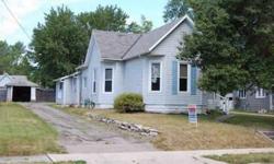 Good Investment or Starter Home. Turn-of-the-Century 3Bd., 1Ba., 1530Sf. One Story with Very Large Country Kitchen and Living Room. Original Hardwood Floors. Tons of Built-Ins. 7" and 9" Wood Window/Door Trim. Located on a Large Lot with Mature Trees in a