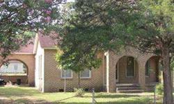 CHARMING OLDER BRICK HOME WITH ARCHED ENTRANCE 2-1 WOOD FLOORS, ON 1.33 ACRES. LOTS OF HWY FRONTAGE. NICELY LANDSCAPEDListing originally posted at http
