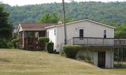 3 Bedroom, 3 Bath, Large Family room with stone fireplace, walk out lower level. Views of moutains and rolling pastures in every direction. Located in Sugar Grove Pendleton County W.V. One hour from Harrisonburg VA. and 2 1/2 hours from Washington D.C.