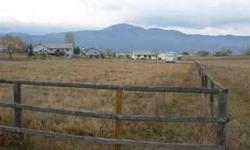 This 1 acre lot is located about 5 miles from Missoula off Mullan Road. Many nice homes surround this lot. Lot has corner pins marked and the city sewer is on the lot. Great area to build that dream home.Listing originally posted at http