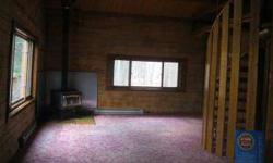 Log home in a private peaceful setting on 8+ acres which backs up to state land. Has 3+ bedrooms, 1 bath, vaulted ceilings and a loft. Many trails throughout the land, a fire ring and a workshop.
Listing originally posted at http