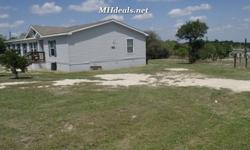 Standing at 2,304 square feet (32x 72) and standing on .73 acres, this 3 bedroom 2 bathroom double wide home is a great starter home for anyone. Resides minutes from town in a beautiful country setting. The interior comes with