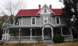 A very large (11 Rooms) Victorian Home in Bethel, DE is now Available. The Grandeur of Yesteryear is waiting to be Reborn. The house has a front porch that wraps around the side, a two level porch on one side, a small porch off the kitchen and another off