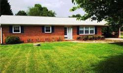 One level brick ranch home! Hardwood floors in den and entry, Den with gas log fireplace & built in shelves, Formal living room, Eat in Kitchen with tile backsplash, Master bedroom with walk in closet, Sunroom with tile floors, large laundry room, storage