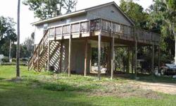 Brand new, never-lived-in stilt house featuring great views of Florida's second largest lake! Living area, decking, kitchen, tile bath with shower and two bedrooms on upper level; laundry/utility room with half bath on lower level. Wood tongue & groove