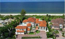 1143 Casey Key Road Nokomis, Florida. One of the very finest and largest direct beachfront properties on all of Casey Key. 147 feet of Gulf frontage, 1.29 acre; wide and historically stable beach; Lovely lawn with raised deck with fire pit and fountains