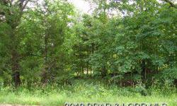 Nice Acreage with Paved Road Frontage. Wooded Acreage and a great location to build a home. Electric by property.Listing originally posted at http