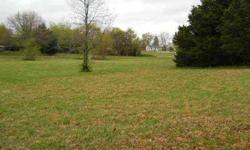 This a beautiful corner lot in a small town. State HWY frontage. Lot is clen and open. There are a few trees. This lot is ready to start to building on. City water and sewer. Very Very nice.Listing originally posted at http