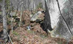 Wonderful easy build lot at the end of Winesap Blvd. Peace & quiet with a small wet weather creek. Beautiful boulders on property to enhance your new home. Best priced lot in Rumbling Bald.-Listing originally posted at http