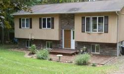Snuggled in the woods with only a few neighbor's, this ready to move into bi-level has radiant heated floors, stainless steal appliances, updated kitchen and bathsListing originally posted at http
