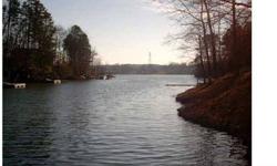 Here's a chance to have that lakefront property at an affordable price. This lot has been permitted for a dock/pier by Duke. Pier platform is already in place. Enjoy all of the Riverwalk amenities while being outside of the subdivision gates. Seller