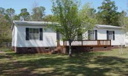Well- maintained doublewide, backs up toCroatan National Forest for privacy, with water access & boat ramp nearby.Excellent neighborhood, short drive to the beach and shopping. Fenced backyard has extra gate in the back. Nice large deck for outdoor