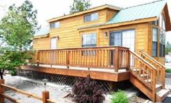 Enjoy this 2008 high end park model at one of the greatest getaways around. You can enjoy the Pend Oreille river or take a swim in a great pool ,use the hot tub ,sauna, or work out. Entertaining a crowd no problem use the expansive clubhouse kitchen or