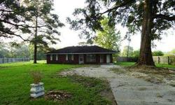 Great Starter Home or Investor Rental Home nestled under nice oaks on a large 1/2 acre lot. Approximately 2 years ago the kitchen was updated with ceramic tile floors and counters, the dining room with wood laminate flooring, and some new lighting