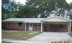 In-town location. 3/2 brick home with many nice updates. Tile floors throughout, updated kitchen cabinets and counter-tops, newer bathroom vanities and flooring, newer roof. Open living and dining plus separate office space off of dining room. 2 car carp