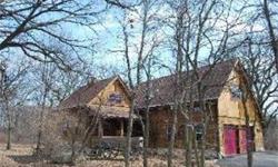 Enjoy the Custom 3038 sf Log Cabin (circa 1926) to live in or Development possibilities, 1.5 acre wooded lot with pond view, beautiful piece of property, massive stone fireplace, 4 baths, Cherry wood floors 10ft bsmt, w/exterior access, close to