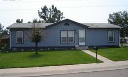 Spacious and well-maintained 3 bedroom (plus an office), 2 bath manufactured home. Situated on a fully fenced corner lot. Nicely landscaped. Central air, hot tub, sprinkler system. Over-sized 2 car detached garage plus additional off-street parkiing.