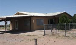Just like new. Completly remodeled. Country living on the edge of town, paved road on one side. New appliances ,fans, baths, tile, stucco, roof. Less than five minutes to town.
Listing originally posted at http