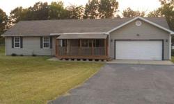 Charming 1999 built home offers three bedrooms, office or possible 4th bedroom, two full bathrooms, enclosed patio , attached garage, large eat-in kitchen and over two acres of peaceful land. This home is located just minutes from town and Hwy 71. Don't