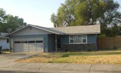 Ranch style home located in Hermiston. 3 bedrooms, 2 bathrooms built in 1976. New laminate flooring, paint, and ceiling fan. 2 car attached garage. Fenced backyard with tool shed.Listing originally posted at http