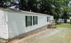 Lyman Lake - 2 bedroom 2 bath mobile home on lake front lot with dock overlooking big water. Home is underpinned and in good condition and completely furnished. Nice level lot.Listing originally posted at http