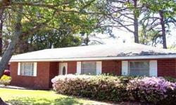 THIS AFFORDABLE BRICK HOME NEAR HOSPITAL AND COLLEGE has spacious rooms and is truly move-in ready! Features include 3 Bedrooms, 2 Full Baths, spacious Living/Dining combo, den with brick fireplace, separate laundry room, a corner location with fenced