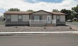 Beautiful home with Butte view. 3 Bedroom 2 bath home with a large garage/shop. Shop/Garage is 26X32 with vaulted ceilings and has a garage door that is 16X9. This home is on a corner lot with a low maintenance yard.Listing originally posted at http