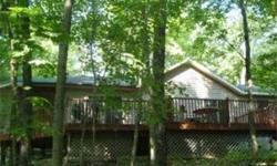 Lake Wildwood Private recreational lake community offering amenities including 2 lakes (218 acre and 14 acre), beaches, pool, sports areas, and activities. Home is on a beautifully wooded double lot backing to common area with seasonal lake view. Two bdr,