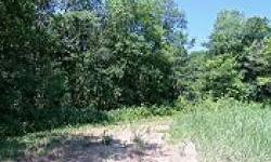 BEAUTIFUL TIMBERED LAND!! 90% Timber, Pond, owner has this property in Ag for Hay, has a place to build your dream home. This property fronts Hwy 82, Creek runs through the property, the owner has built a bridge to cross over creek. New Lake will be