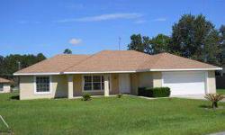 RELAX ON THE COVERED FRONT PORCH OF THIS NICE 3/2/2 SPLIT BEDROOM PLAN IN GOOD AREA OF SILVER SPRINGS SHORES. HOME HAS VAULTED CEILINGS, CEILING FANS, INSIDE LAUNDRY W/TUB, UPGRADED WINDOW TREATMENTS. KITCHEN IS LIGHT & BRIGHT WITH CAN LIGHTING. EXTRA