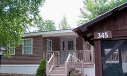 PRICE IMPROVEMENT!! MOTIVATED Seller--may consider some owner financing. This is "luxury camping" at it's best! Immaculately maintained, turn key Park Model with large, professionally built knotty pine addition. Turn key...just bring your tooth brush.