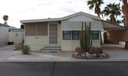 CUTE AND COZY WITH HEAVY DUTY W/D IN SHED, COVERED CARPORT AND NEW HEAT PUMP AND MICROWAVE WITH CONVECTION. ENCLOSED AZ ROOM (ADDS AN EXTRA 300 SQ FT APPROXIMATELY) WITH BUILT IN COUNTER AND BOOK SHELVES. SCREENED AZ ROOM IS FURNISHED AND INVITING. SOME