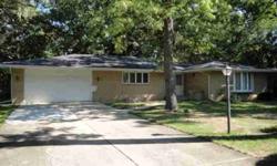 Gracious and Spacious best describes this all-brick, 2 bedroom home located on a large wooded lot, in a well established neighborhood. This quality built home has beautiful hardwood floors, loads of closets, many built-in cabinets, and large rooms.