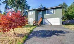 Clean and Bright Bonney Lake split level. 4 bedrooms, 2 1/2 baths and 2 car garage. Large level and fenced yard. Updated, energy efficient windows throughout. Upstairs you'll love the vaulted ceiling and contemporary lighting. The kitchen has raised panel