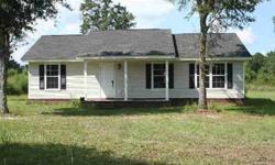 Like new home in the country on 2 acres. Home has very nice features with nice carpet and tile. Has a split bedroom design with nice large master bath. The great room and kitchen/dining area has large open airy design. Kitchen has very nice cabinets and